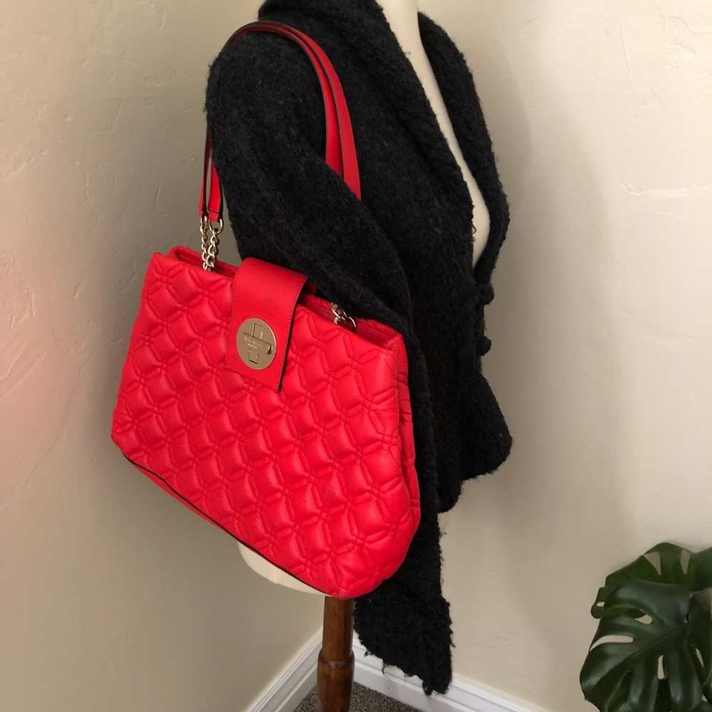 Quilted Kate Spade bag in coral red.